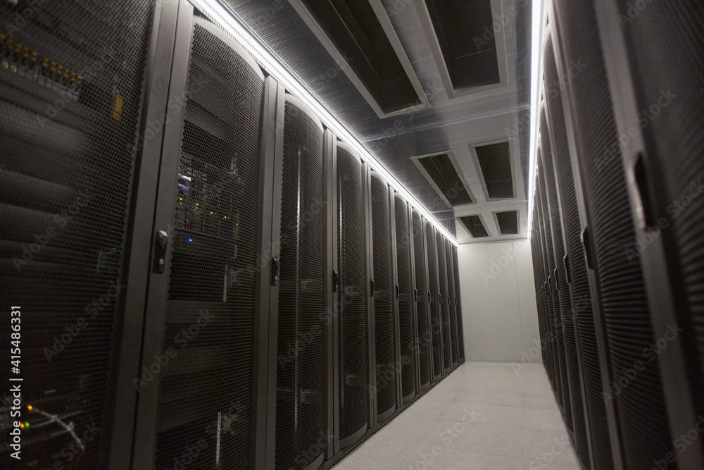 A data-centre hall lined with server cabinets
