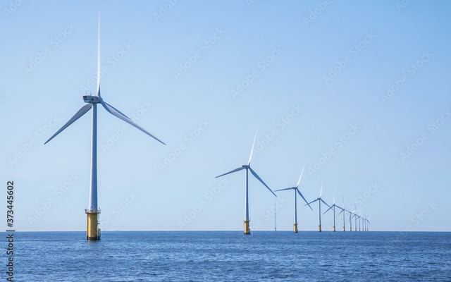 Offshore wind turbines in a calm sea